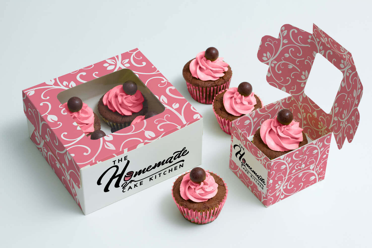 The logo on styled cake boxes